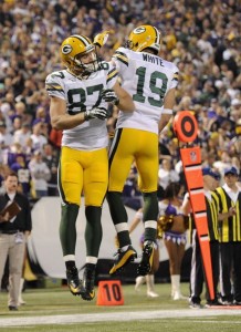 Jordy Nelson caught two touchdowns, giving Myles White and the rest of the team reason to celebrate.
