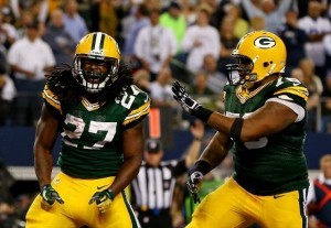 Eddie Lacy and Mike Daniels celebrate Lacy's fourth-quarter touchdown against the Dallas Cowboys.