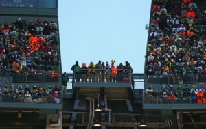 Packers fans may look odd in the cold with strange headgear but they packed Lambeau Field last year to 106.9 percent capacity. There were an average of 77,947 fans a game in a season that had its ups and downs.  
